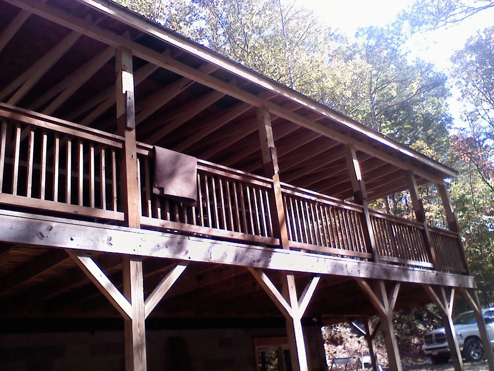 Timber framing under a new elevated porch and deck — Roof Leak Repair in Pablo by Roofing Brothers